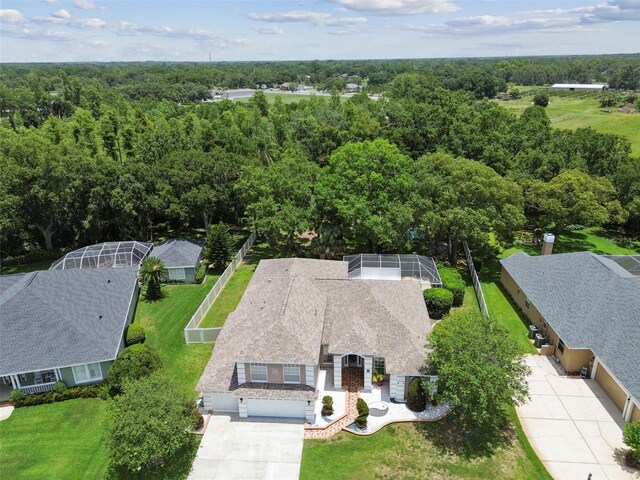 1460 Kensington Woods Dr, Lutz, FL 33549 - aerial view of property and surrounding area with a forest