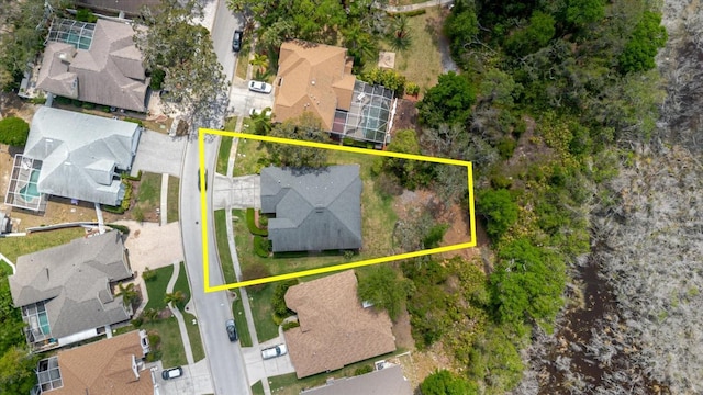 1852 Longview Ln, Tarpon Springs, FL 34689 - aerial perspective of suburban area with property boundaries highlighted