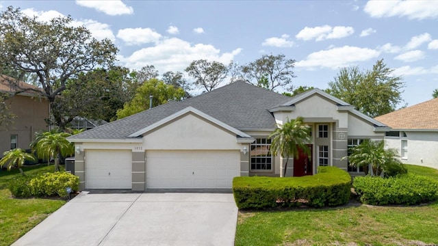 1852 Longview Ln, Tarpon Springs, FL 34689 - single story home with a garage, concrete driveway, stucco siding, and a shingled roof