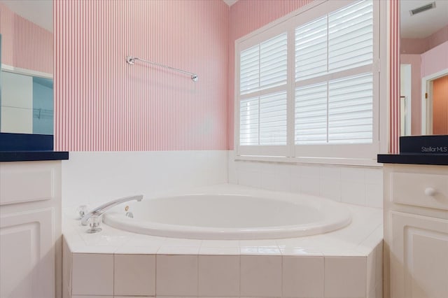 1852 Longview Ln, Tarpon Springs, FL 34689 - bathroom featuring a bath and vanity