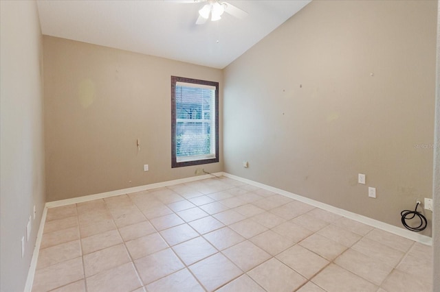 1852 Longview Ln, Tarpon Springs, FL 34689 - unfurnished room with lofted ceiling, light tile patterned flooring, a ceiling fan, and baseboards