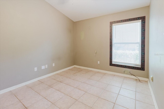 1852 Longview Ln, Tarpon Springs, FL 34689 - unfurnished room featuring light tile patterned flooring and baseboards