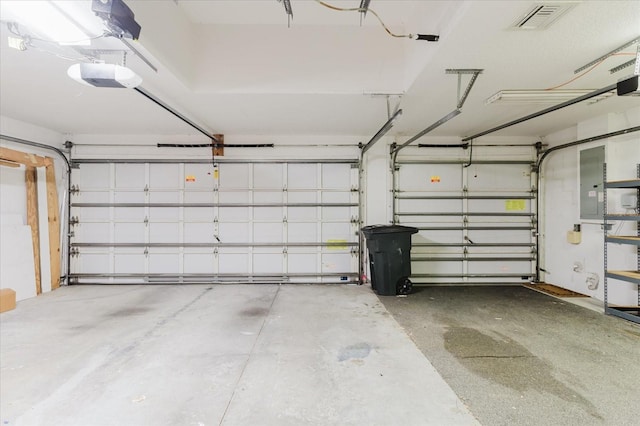 1852 Longview Ln, Tarpon Springs, FL 34689 - garage with a garage door opener and electric panel