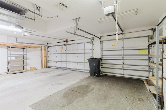 1852 Longview Ln, Tarpon Springs, FL 34689 - garage featuring a garage door opener