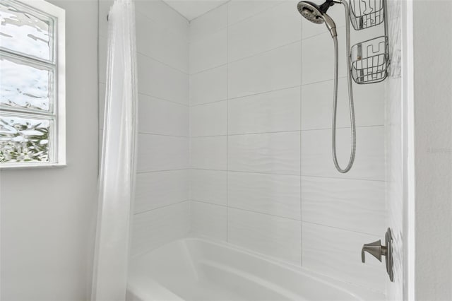 7224 Park St S, St Pete Beach, FL 33707 - bathroom featuring shower / bath combination with curtain