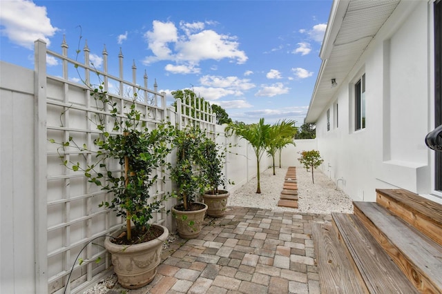 7224 Park St S, St Pete Beach, FL 33707 - fenced backyard with a patio