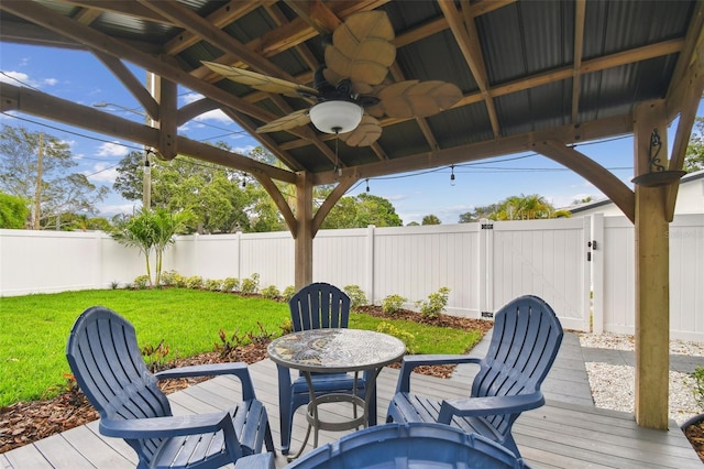 7224 Park St S, St Pete Beach, FL 33707 - deck featuring a gazebo, ceiling fan, and a gate