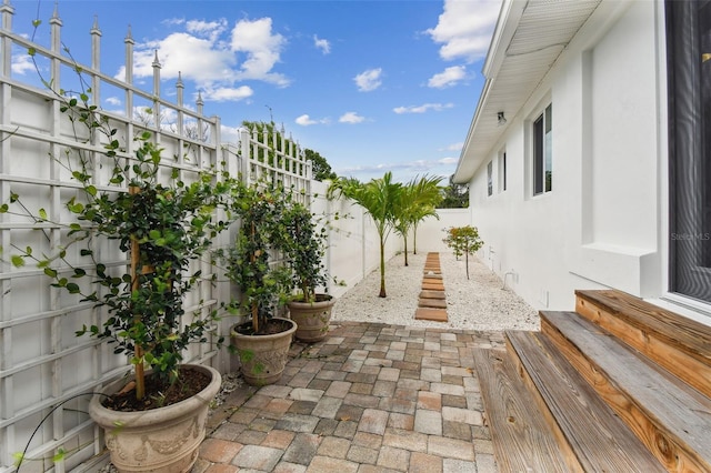 7224 Park St S, St Pete Beach, FL 33707 - fenced backyard with a patio area