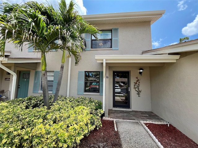 2131 Ridge Rd S Unit 76, Largo, FL 33778 - view of exterior entry with stucco siding