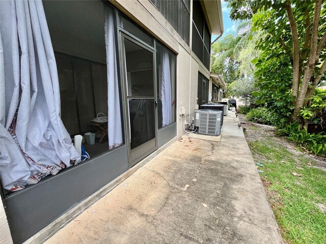 2131 Ridge Rd S Unit 76, Largo, FL 33778 - view of patio featuring central AC