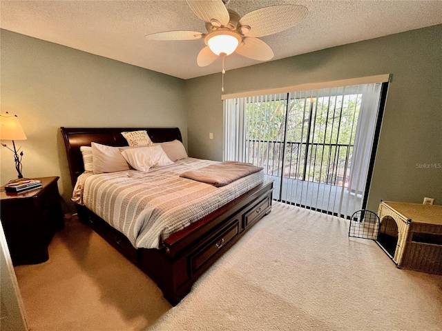 2131 Ridge Rd S Unit 76, Largo, FL 33778 - bedroom with access to outside, light carpet, a textured ceiling, and ceiling fan