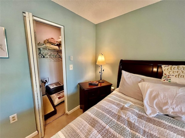 2131 Ridge Rd S Unit 76, Largo, FL 33778 - carpeted bedroom with baseboards and a closet