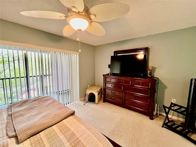2131 Ridge Rd S Unit 76, Largo, FL 33778 - carpeted bedroom featuring ceiling fan and a textured ceiling