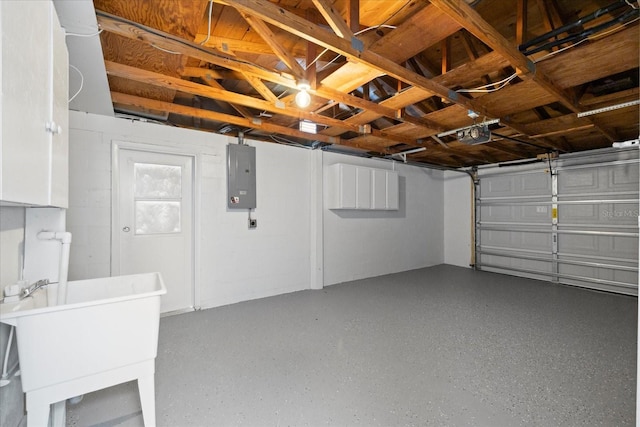 7330 Abalone Dr, Port Richey, FL 34668 - garage with electric panel and a sink
