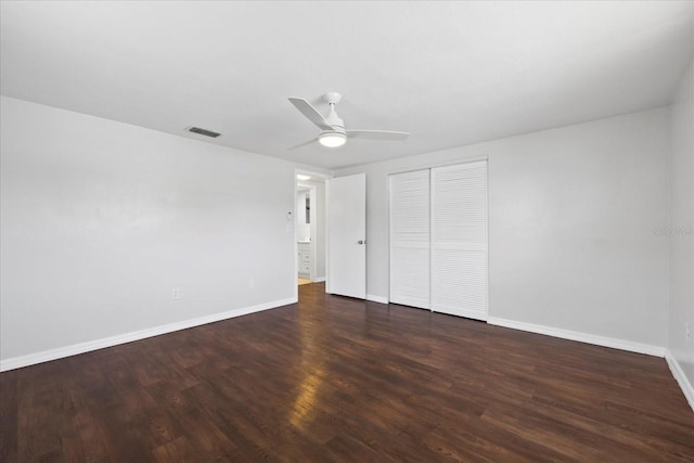 7330 Abalone Dr, Port Richey, FL 34668 - unfurnished bedroom with wood finished floors, a closet, and a ceiling fan