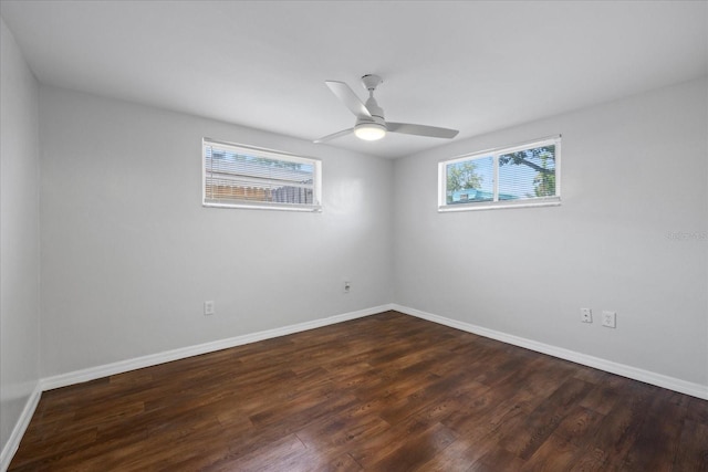 7330 Abalone Dr, Port Richey, FL 34668 - spare room with dark wood-type flooring and a ceiling fan