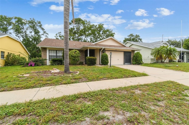 13127 Topflite Ct, Hudson, FL 34669 - ranch-style house featuring a front lawn, driveway, and a garage
