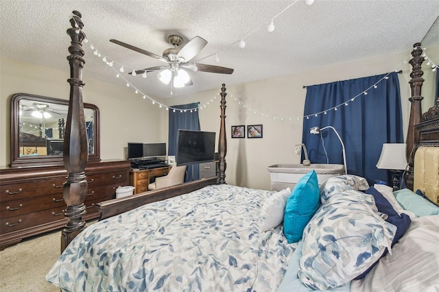 13127 Topflite Ct, Hudson, FL 34669 - bedroom with a textured ceiling, carpet floors, and ceiling fan