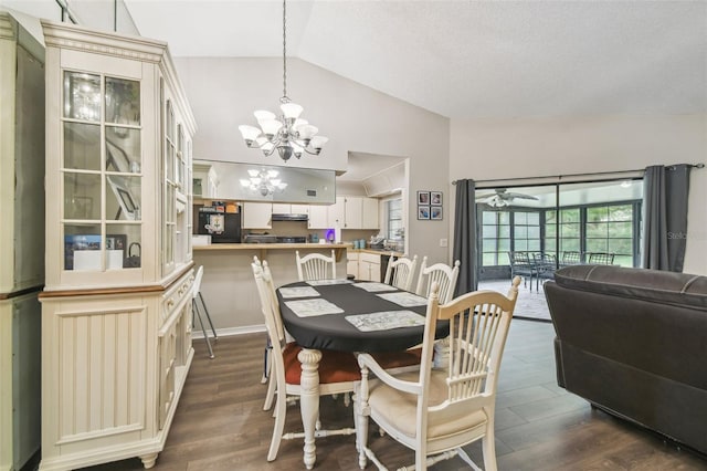13127 Topflite Ct, Hudson, FL 34669 - dining area with lofted ceiling, a chandelier, and dark wood-style floors