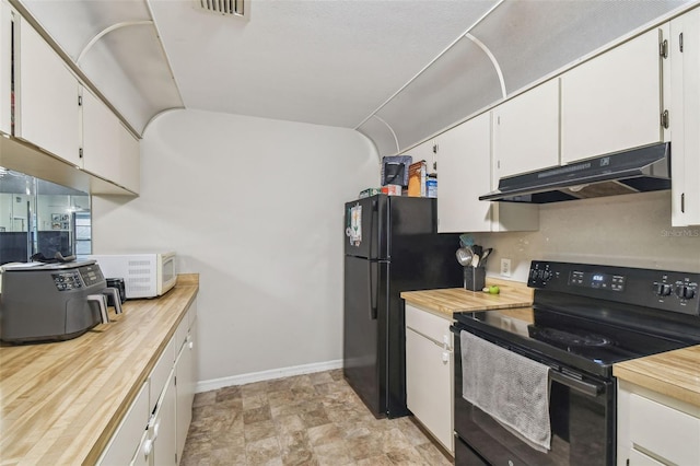 13127 Topflite Ct, Hudson, FL 34669 - kitchen featuring black appliances, under cabinet range hood, white cabinets, baseboards, and wooden counters