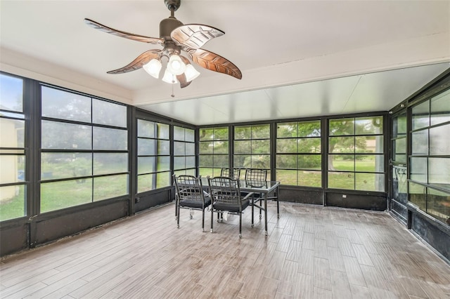 13127 Topflite Ct, Hudson, FL 34669 - sunroom / solarium with a ceiling fan, outdoor dining space, and plenty of natural light