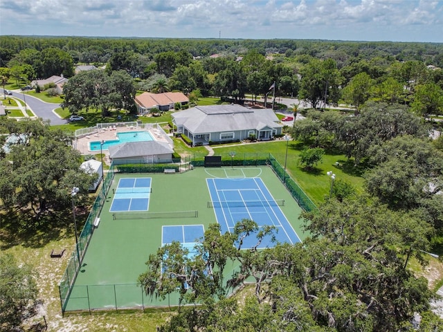13127 Topflite Ct, Hudson, FL 34669 - aerial view of a pool area and a forest