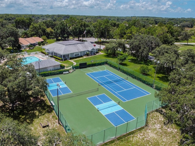 13127 Topflite Ct, Hudson, FL 34669 - drone / aerial view of a heavily wooded area and a pool area