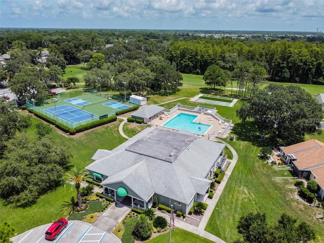 13127 Topflite Ct, Hudson, FL 34669 - aerial view of a pool and a forest
