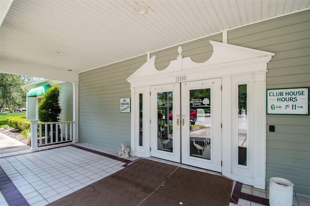 13127 Topflite Ct, Hudson, FL 34669 - entrance to property featuring french doors