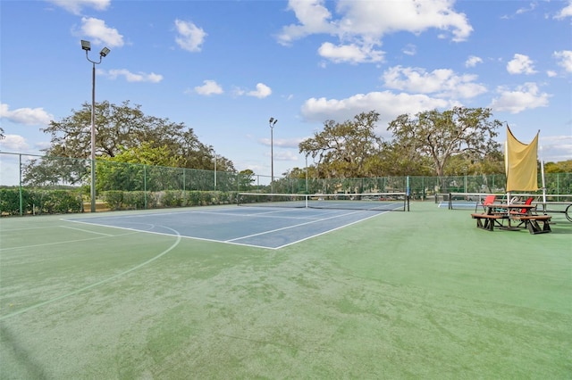 13127 Topflite Ct, Hudson, FL 34669 - view of tennis court with community basketball court