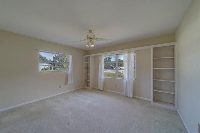501 Poinsettia Rd, Belleair, FL 33756 - spare room with plenty of natural light, carpet, and baseboards