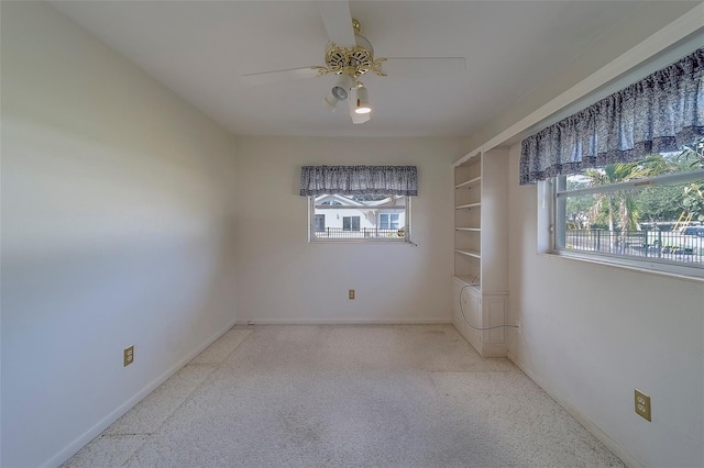501 Poinsettia Rd, Belleair, FL 33756 - unfurnished room with carpet, baseboards, and ceiling fan