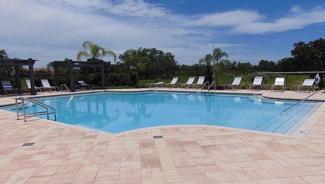 4444 Aqua Mirage St, Sarasota, FL 34238 - community pool with a pergola and a patio area