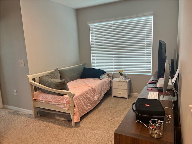 4444 Aqua Mirage St, Sarasota, FL 34238 - carpeted bedroom featuring baseboards