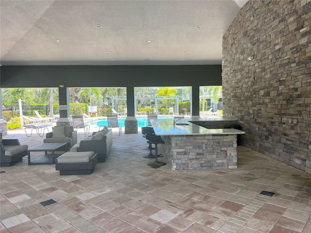 4444 Aqua Mirage St, Sarasota, FL 34238 - view of patio / terrace with an outdoor pool