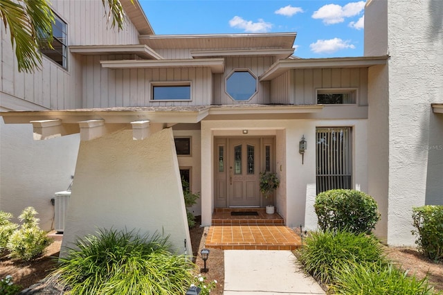 3133 Harvest Moon Dr, Palm Harbor, FL 34683 - property entrance with stucco siding