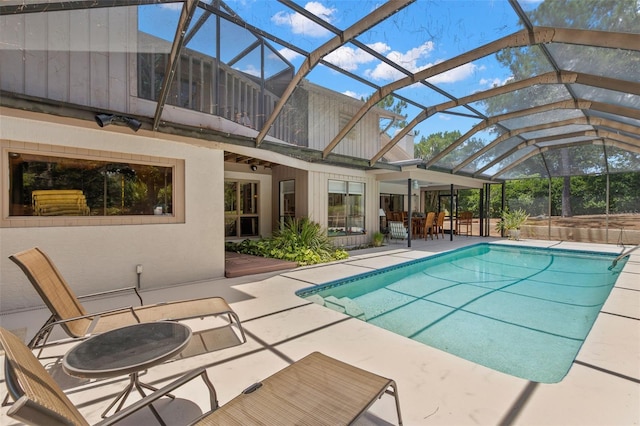 3133 Harvest Moon Dr, Palm Harbor, FL 34683 - swimming pool with a patio and glass enclosure