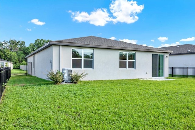 3146 Forrest Plum Ct, Zephyrhills, FL 33540 - rear view of property featuring stucco siding, central air condition unit, and roof with shingles