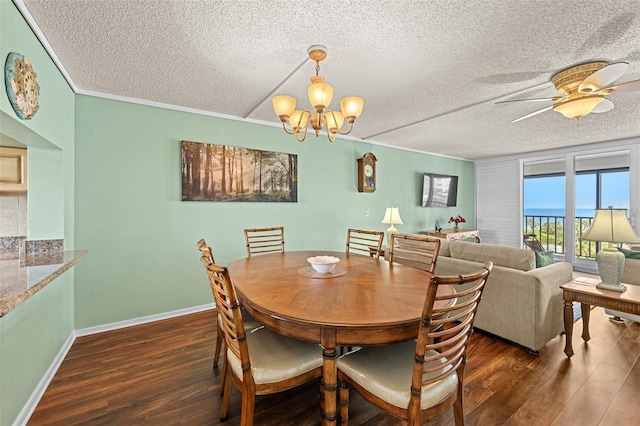 1581 Gulf Blvd Unit 403N, Clearwater Beach, FL 33767 - dining area featuring dark wood finished floors, a textured ceiling, a chandelier, a ceiling fan, and baseboards