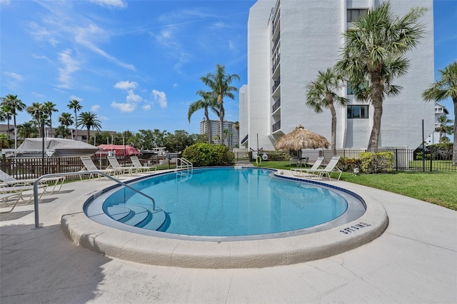 1581 Gulf Blvd Unit 403N, Clearwater Beach, FL 33767 - community pool featuring a patio area