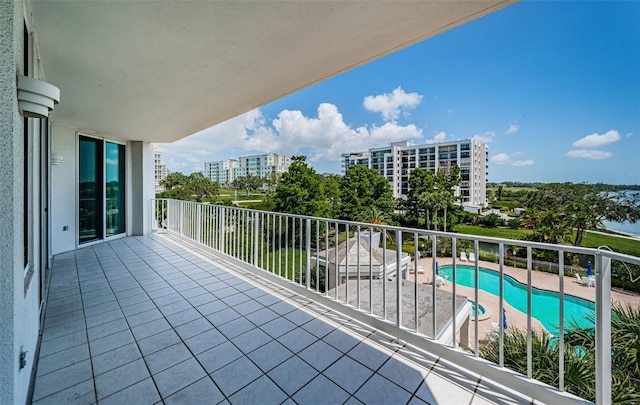 1 Seaside Ln Unit 302, Belleair, FL 33756 - balcony featuring view of pool area