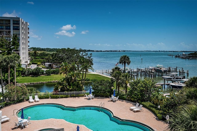 1 Seaside Ln Unit 302, Belleair, FL 33756 - community pool with a patio area and a water view