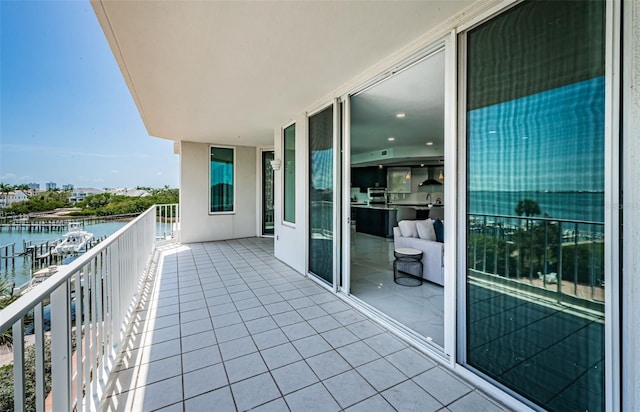 1 Seaside Ln Unit 302, Belleair, FL 33756 - balcony featuring a water view