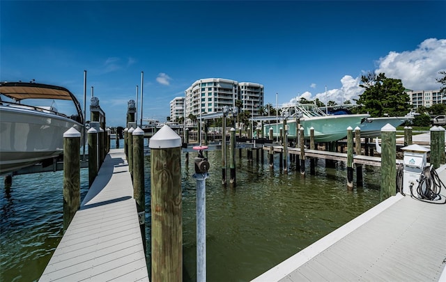 1 Seaside Ln Unit 302, Belleair, FL 33756 - dock area with boat lift and a water view