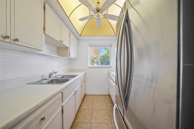 2003 Greenbriar Blvd Unit 1, Clearwater, FL 33763 - kitchen with freestanding refrigerator, a sink, light countertops, decorative backsplash, and a ceiling fan