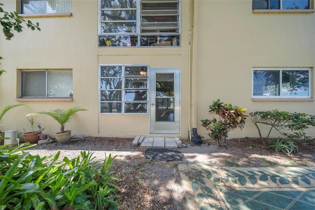 2003 Greenbriar Blvd Unit 1, Clearwater, FL 33763 - doorway to property with stucco siding