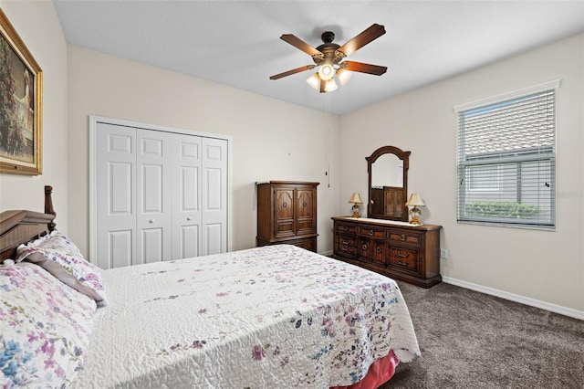 33219 Kateland Dr, Wesley Chapel, FL 33545 - bedroom with carpet, a closet, baseboards, and a ceiling fan