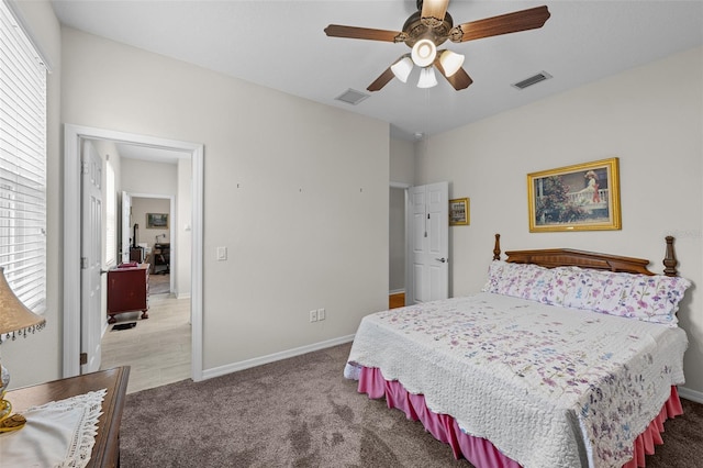 33219 Kateland Dr, Wesley Chapel, FL 33545 - carpeted bedroom with baseboards and a ceiling fan