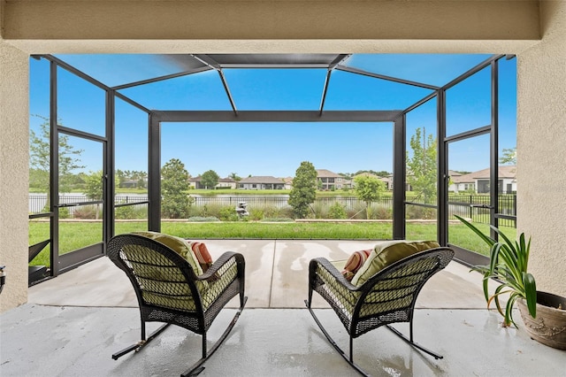 33219 Kateland Dr, Wesley Chapel, FL 33545 - sunroom / solarium with a water view, a residential view, and plenty of natural light