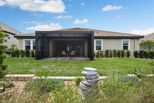 33219 Kateland Dr, Wesley Chapel, FL 33545 - back of property with stucco siding and a tiled roof